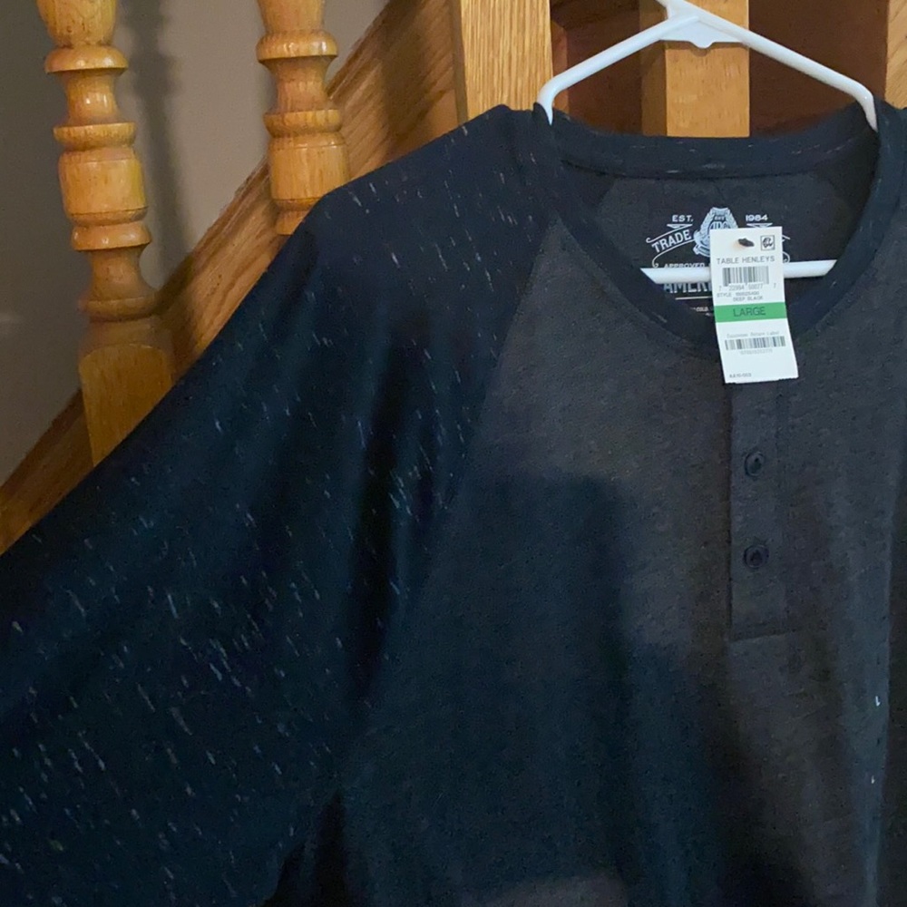 Men's American Rag long sleeve black shirt. 3 buttons at collar table henleys